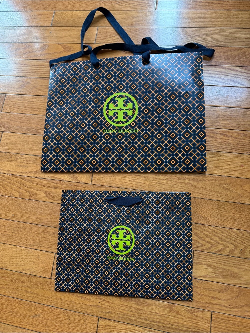 Tory Burch paper bag with Neon Green Logo and Orange Geometric Print
